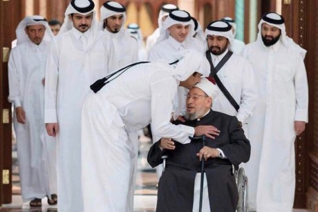 Tamim kisses Qaradawi's front