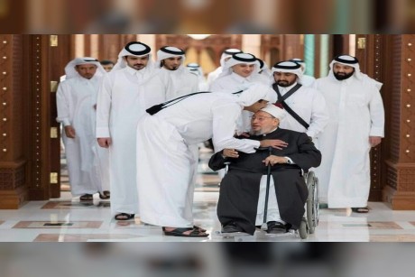 القرضاوي وتميم